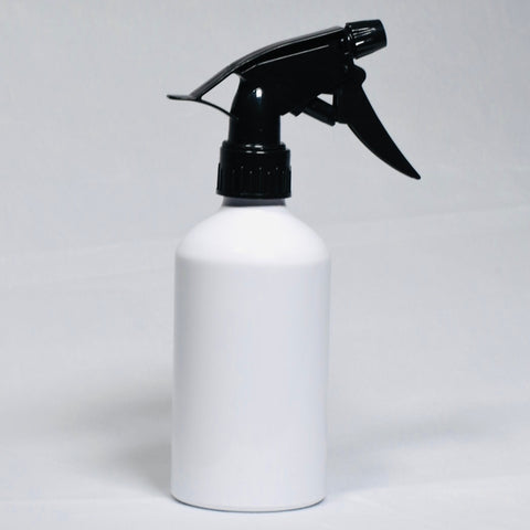 White spray bottle with black top