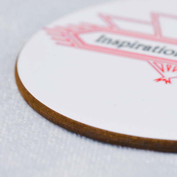 Close up of round wooden coaster